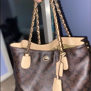 Brown Coach tote purse with gold chain link handles